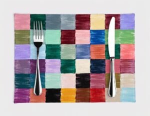 Colorful geometric placemats for Memphis style table decor