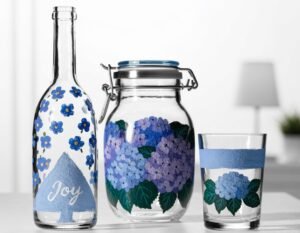 Painted ceramic mugs and craft supplies for beginner DIY mug projects