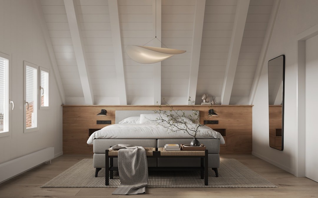 Warm dark wood bedroom furniture paired with cream and beige tones, illustrating colors that complement cherry wood