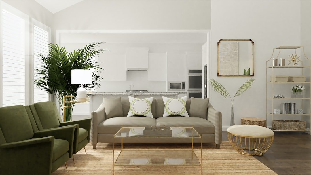 Living room conversation seating arrangement — photo by Spacejoy on Unsplash Living room with a coordinated sofa and chairs arranged around a central coffee table for conversation