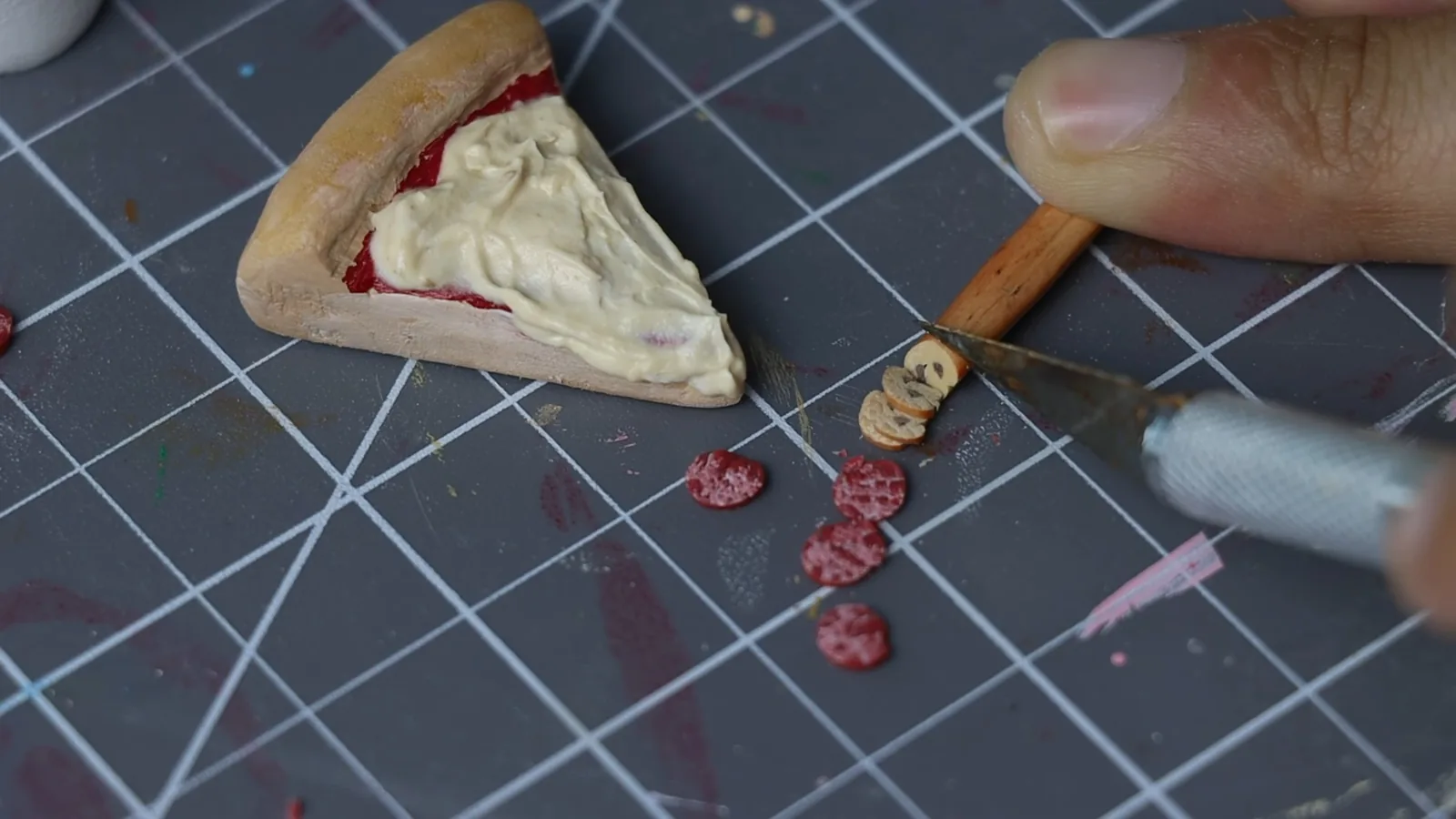 Painting handmade air-dry clay clock ornaments