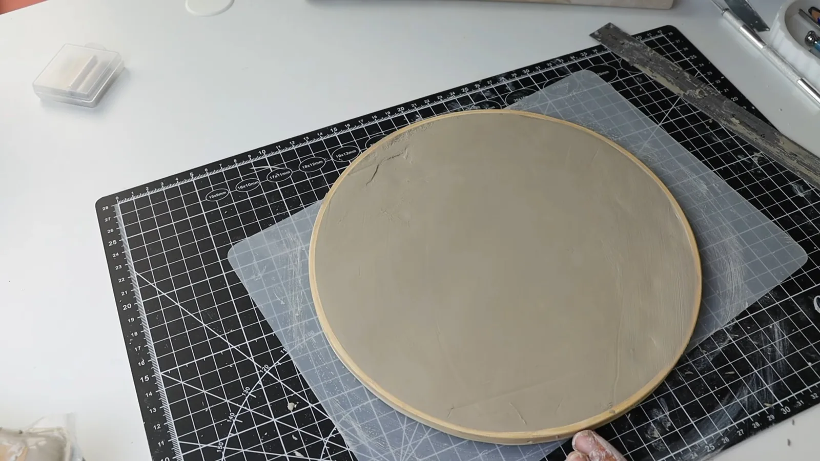 Rolling out the air-dry clay clock face