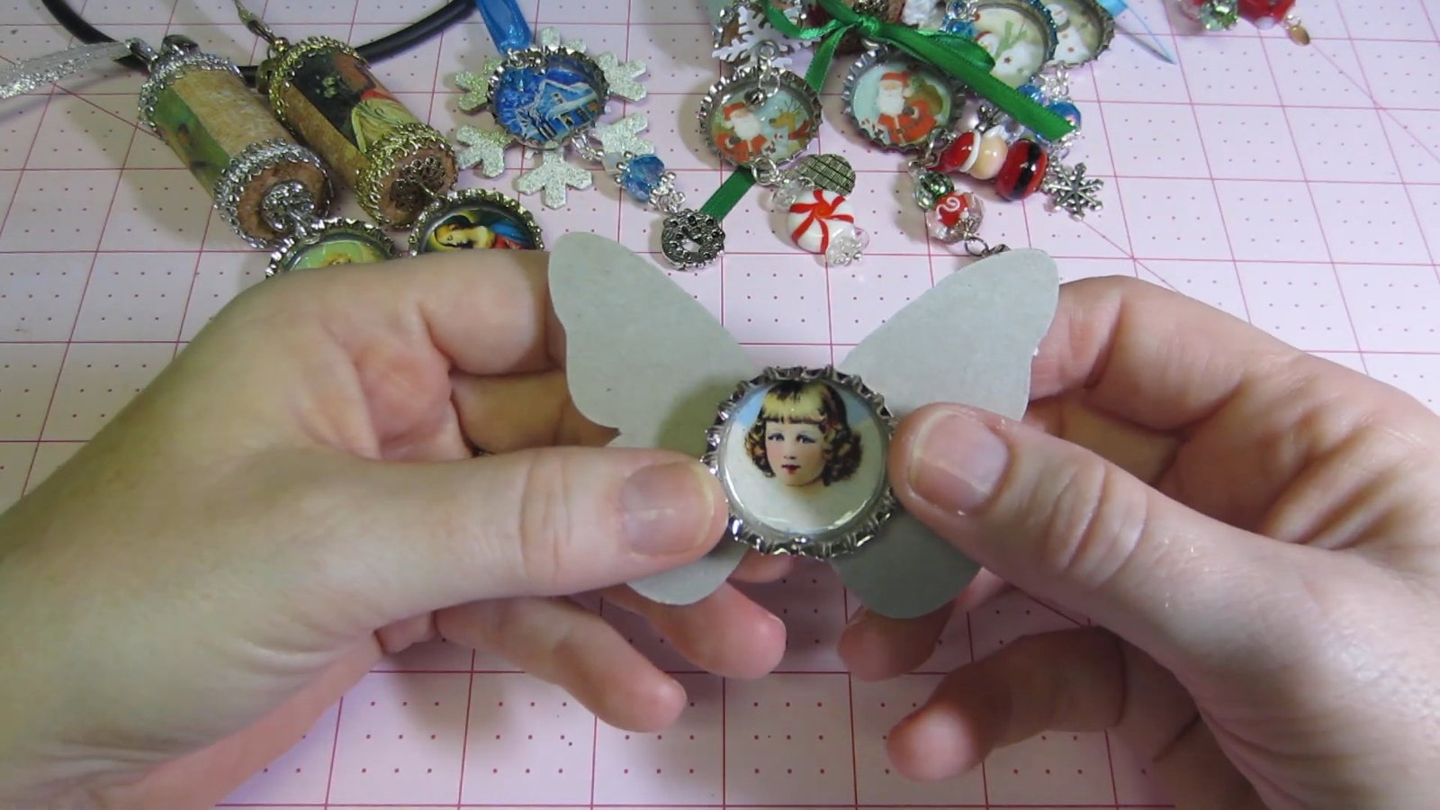Trying a small portrait medallion against an unfinished butterfly-shaped ornament blank